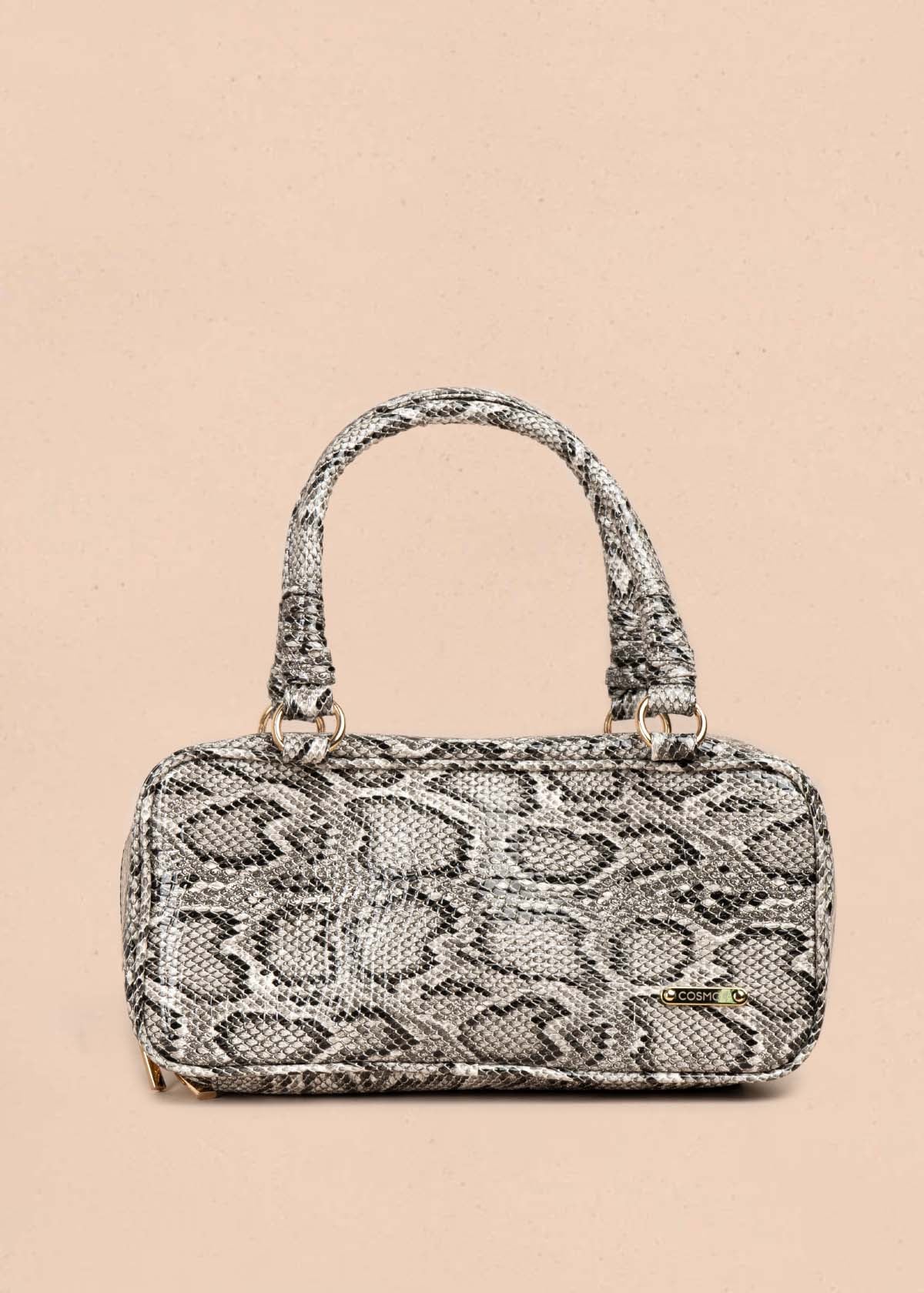 Bolso tipo cartera color blanco con estampado animal print 105564