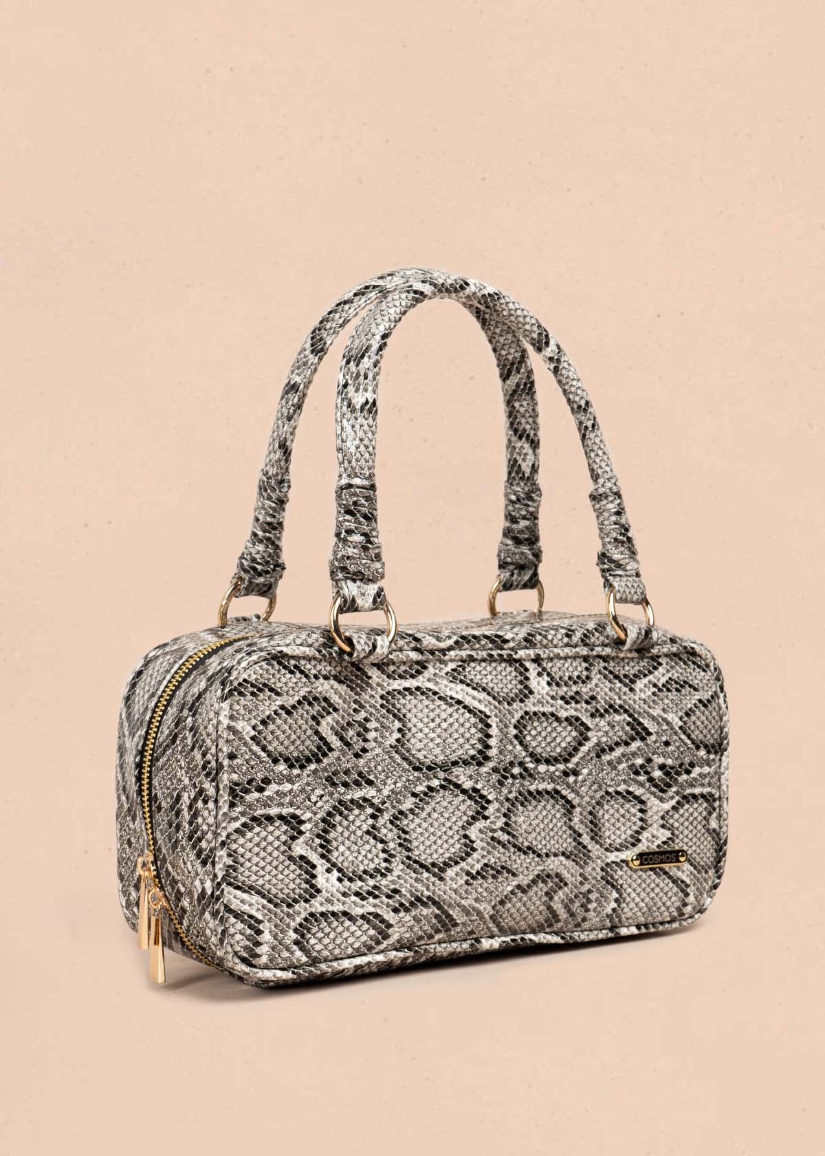 Bolso tipo cartera color blanco con estampado animal print 105564