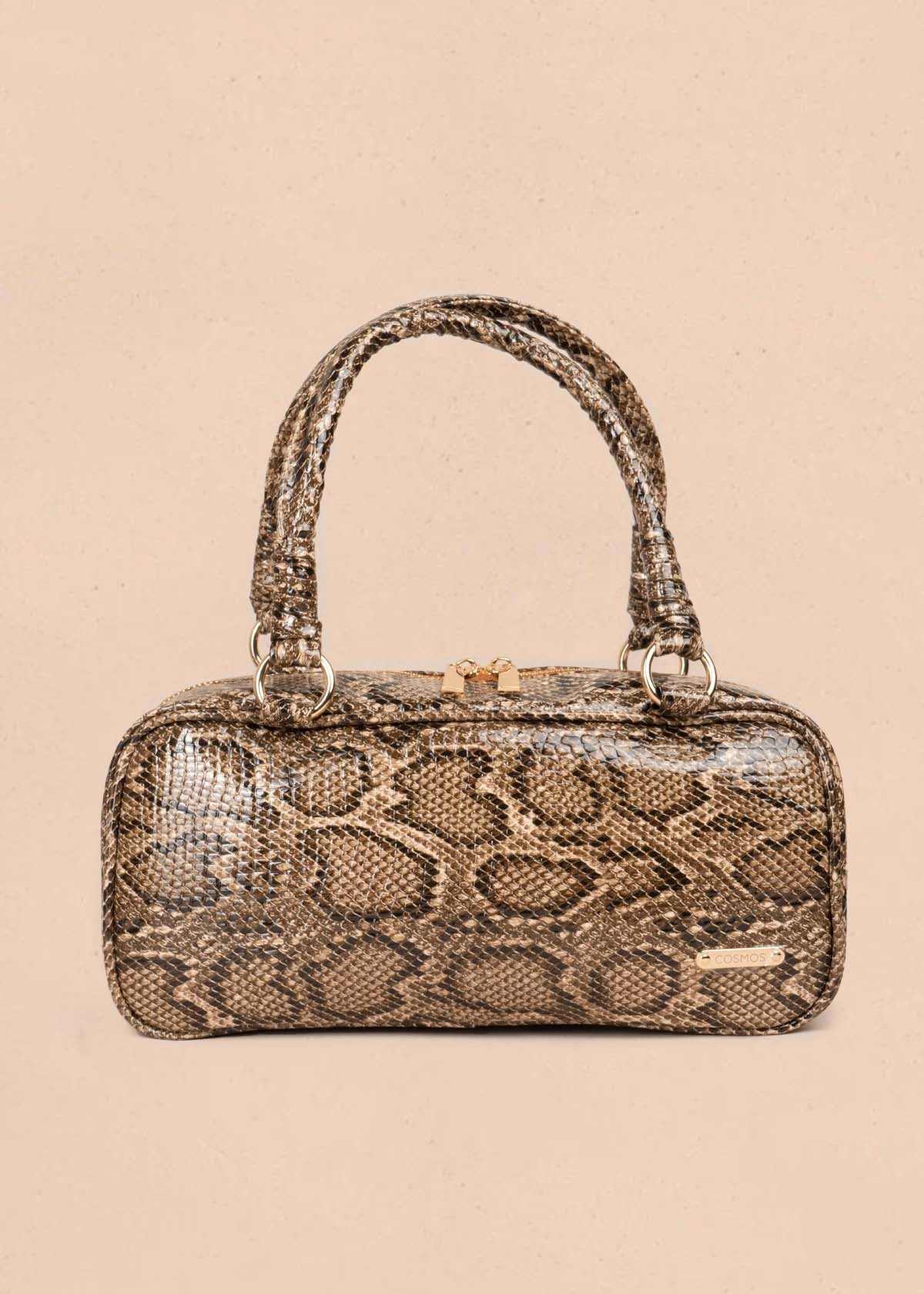 Bolso tipo cartera color camel con estampado animal print 105564