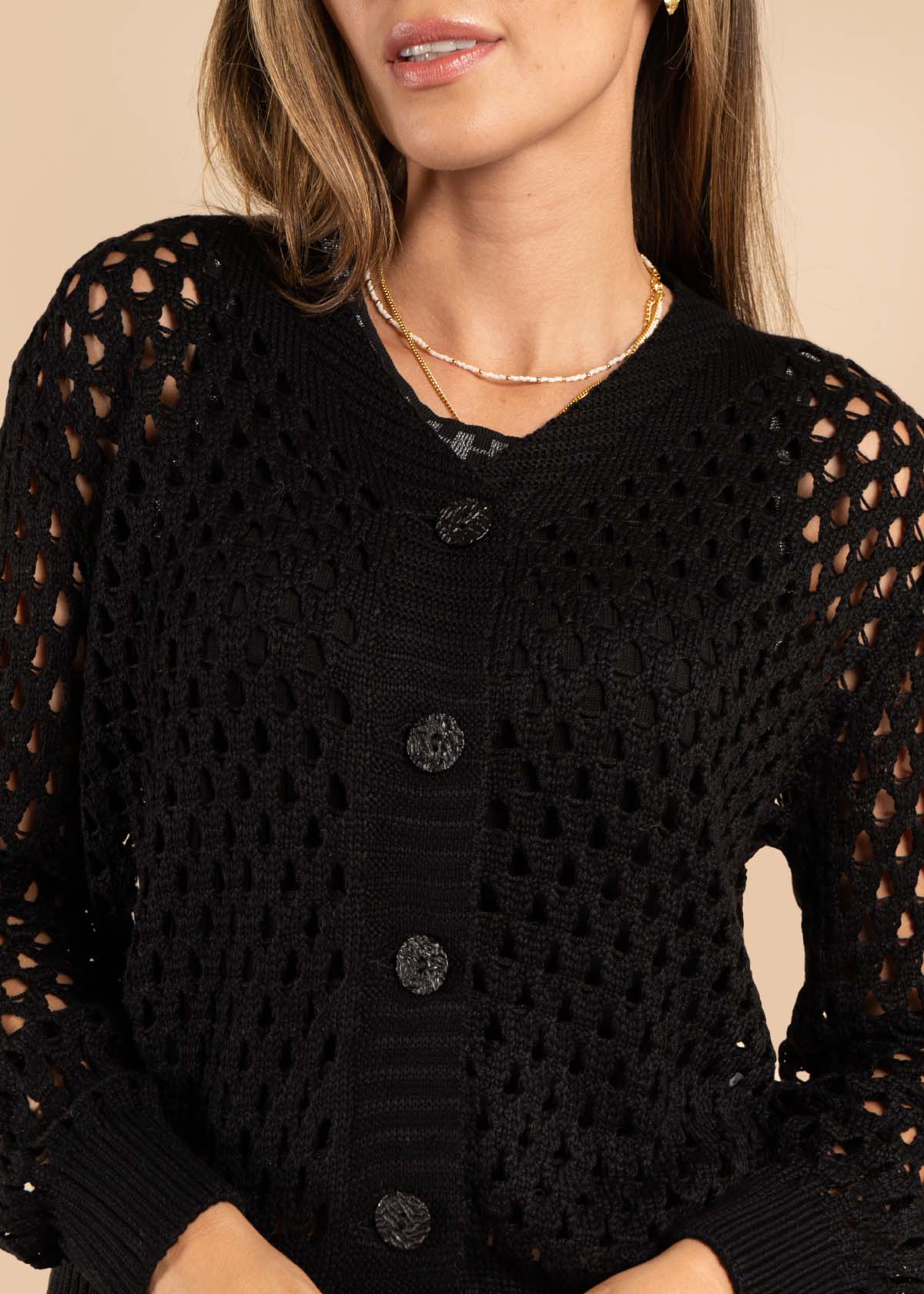 Sweater tejido en malla color negro 105648