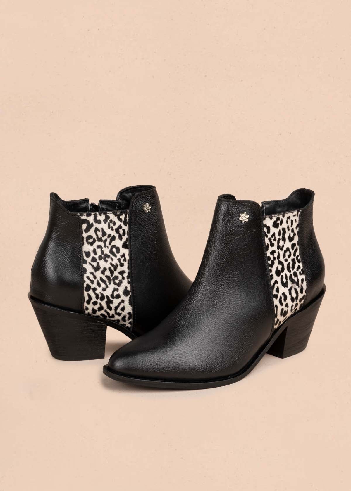 Botines en cuero color negro y cuero con pelo 105704