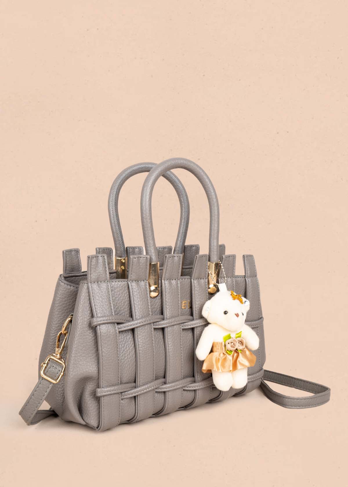 Bolso tipo cartera color gris con llavero 105763