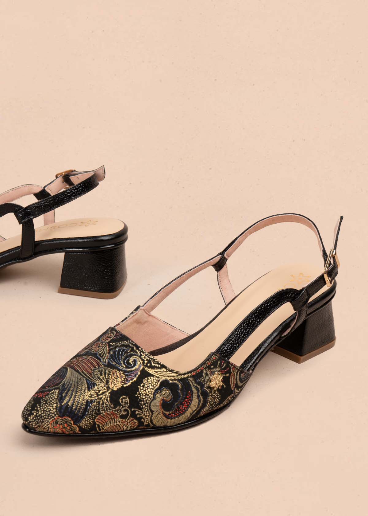 Trabilla en cuero negro con brocado ornamentado 105926