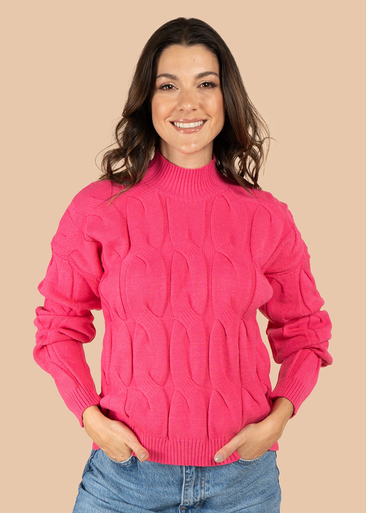 Buzo color fucsia con tejido trenzado 106068