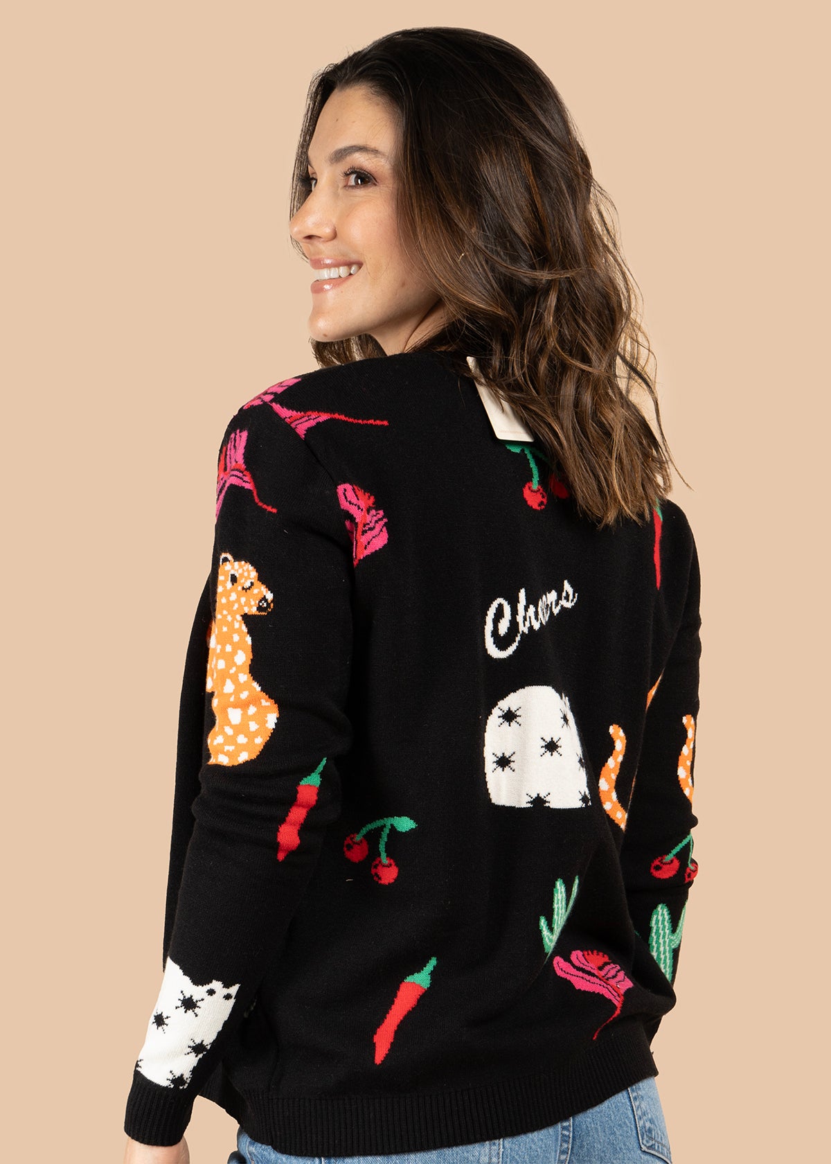 Saco color negro con tejido de leopardos y elementos decorativos 106077