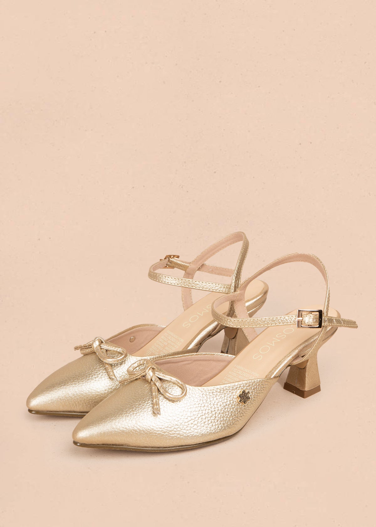 Tacones trabilla en cuero color champaña con moño 106087