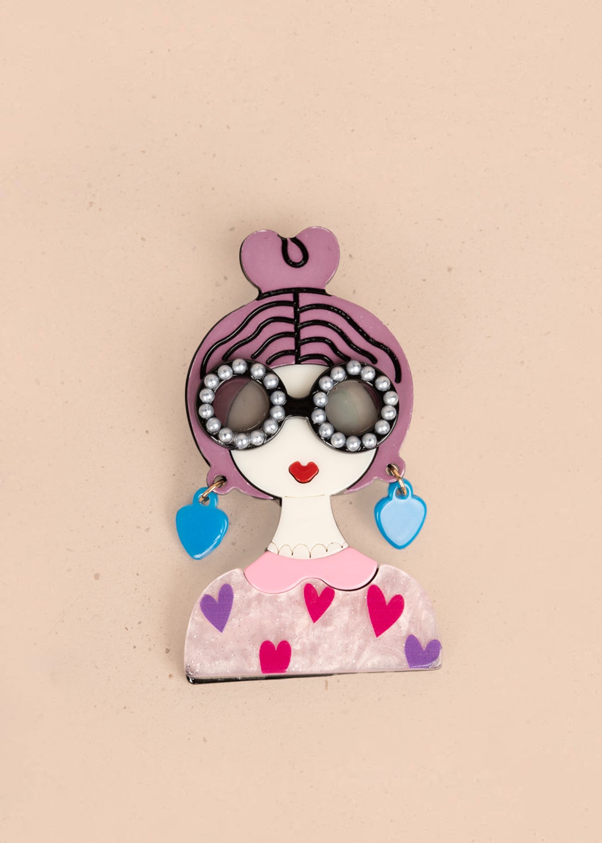 Prendedor de mujer color rosado 106200
