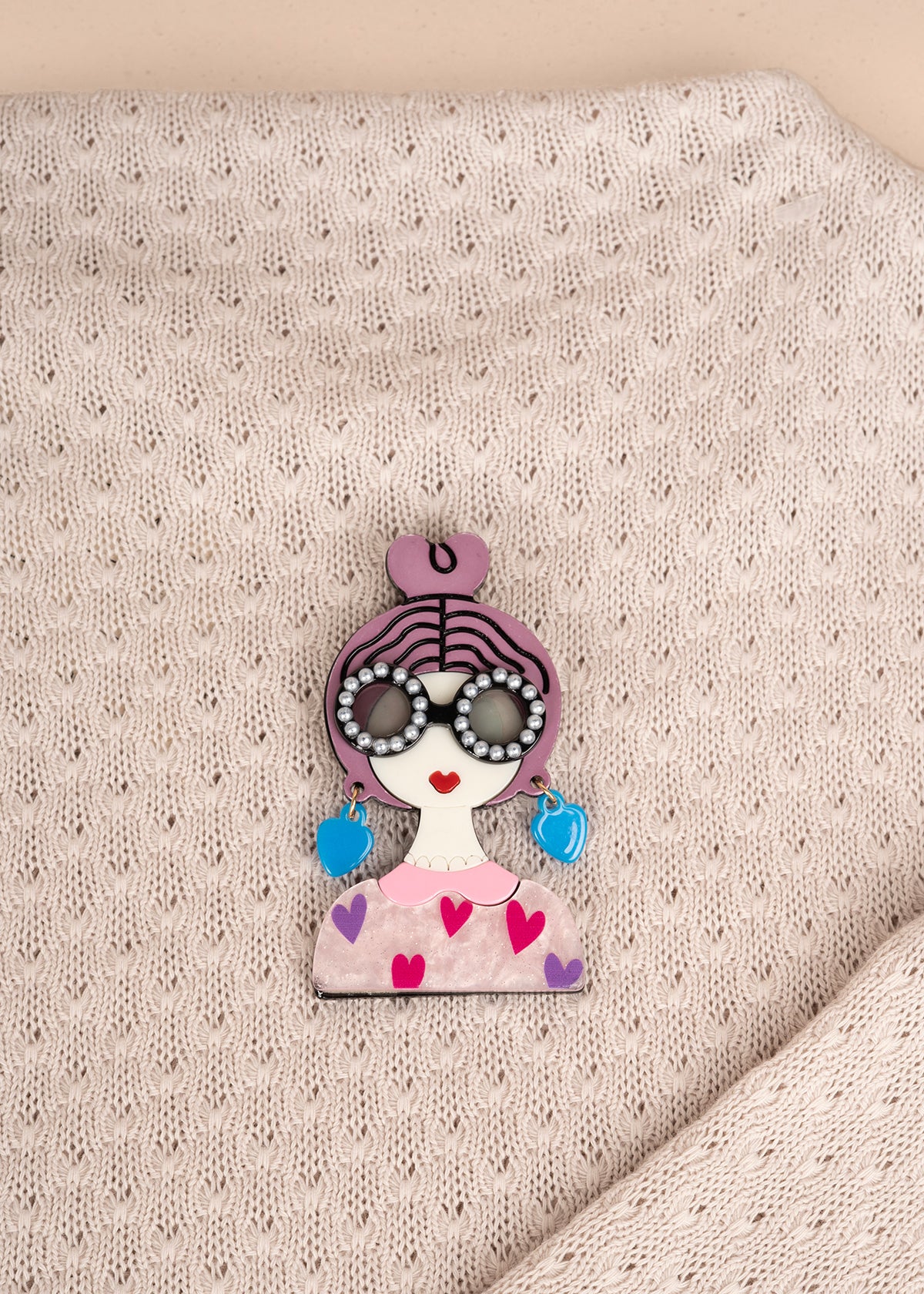 Prendedor de mujer color rosado 106200