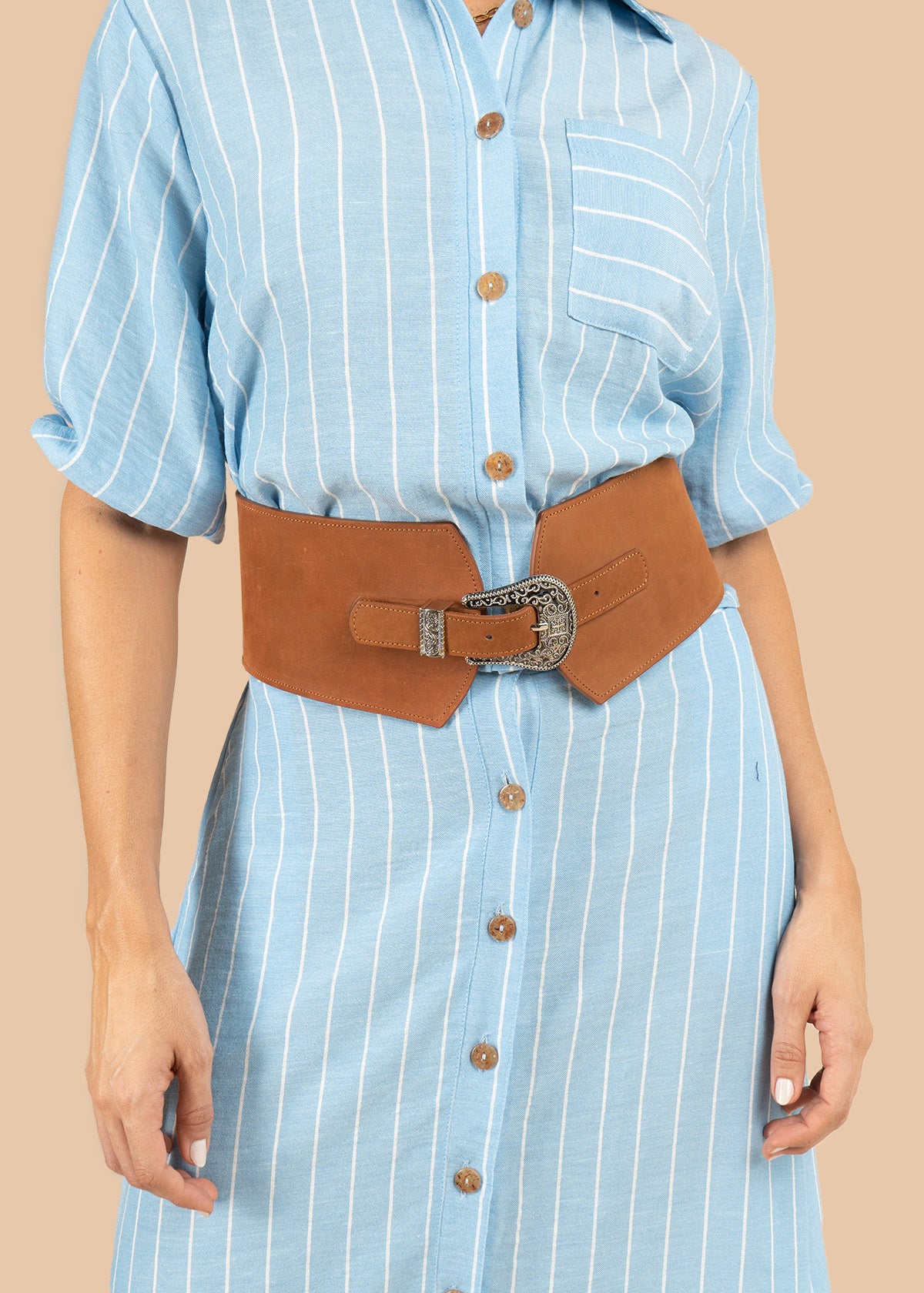 Blusa color azul claro con rayas blancas verticales 106229