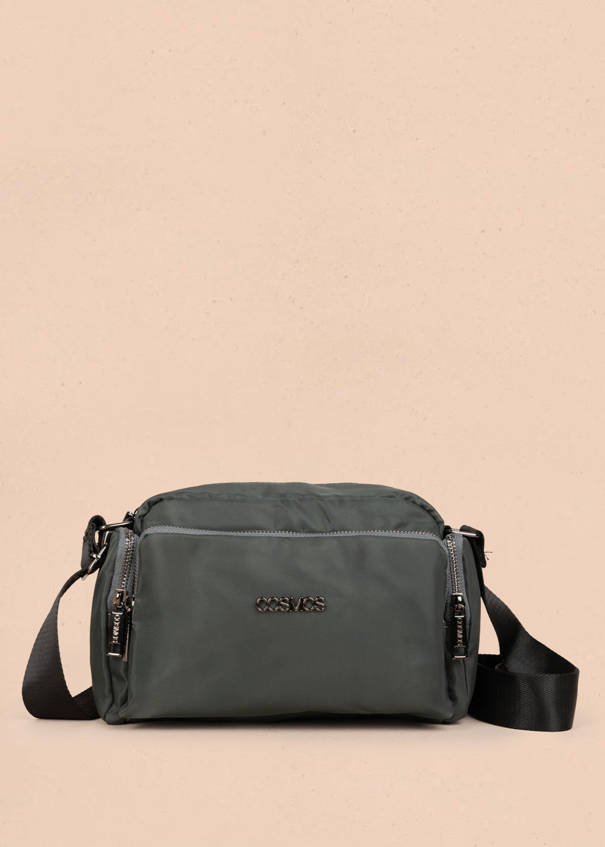 Bolso manos libres color verde con bolsillos laterales y frontal 106294