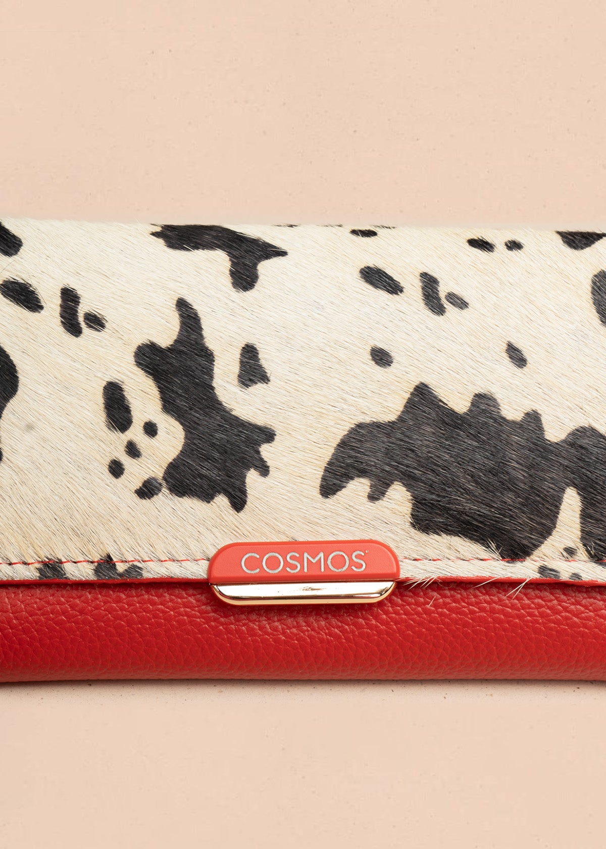 Billetera grande de cuero color rojo con solapa animal print 106319