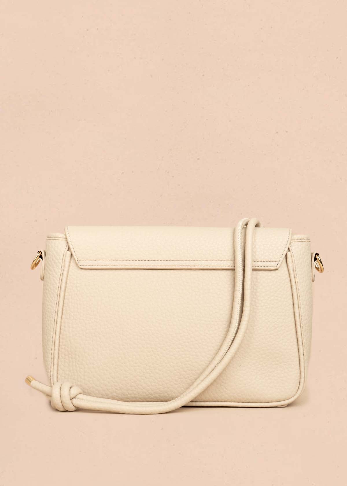 Bolso manos libres color beige texturizado 106325
