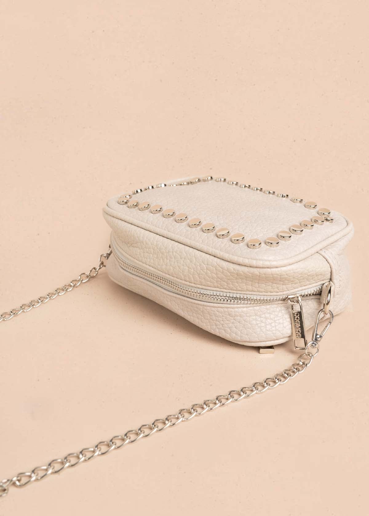 Bolso manos libres color beige con taches frontales 106333