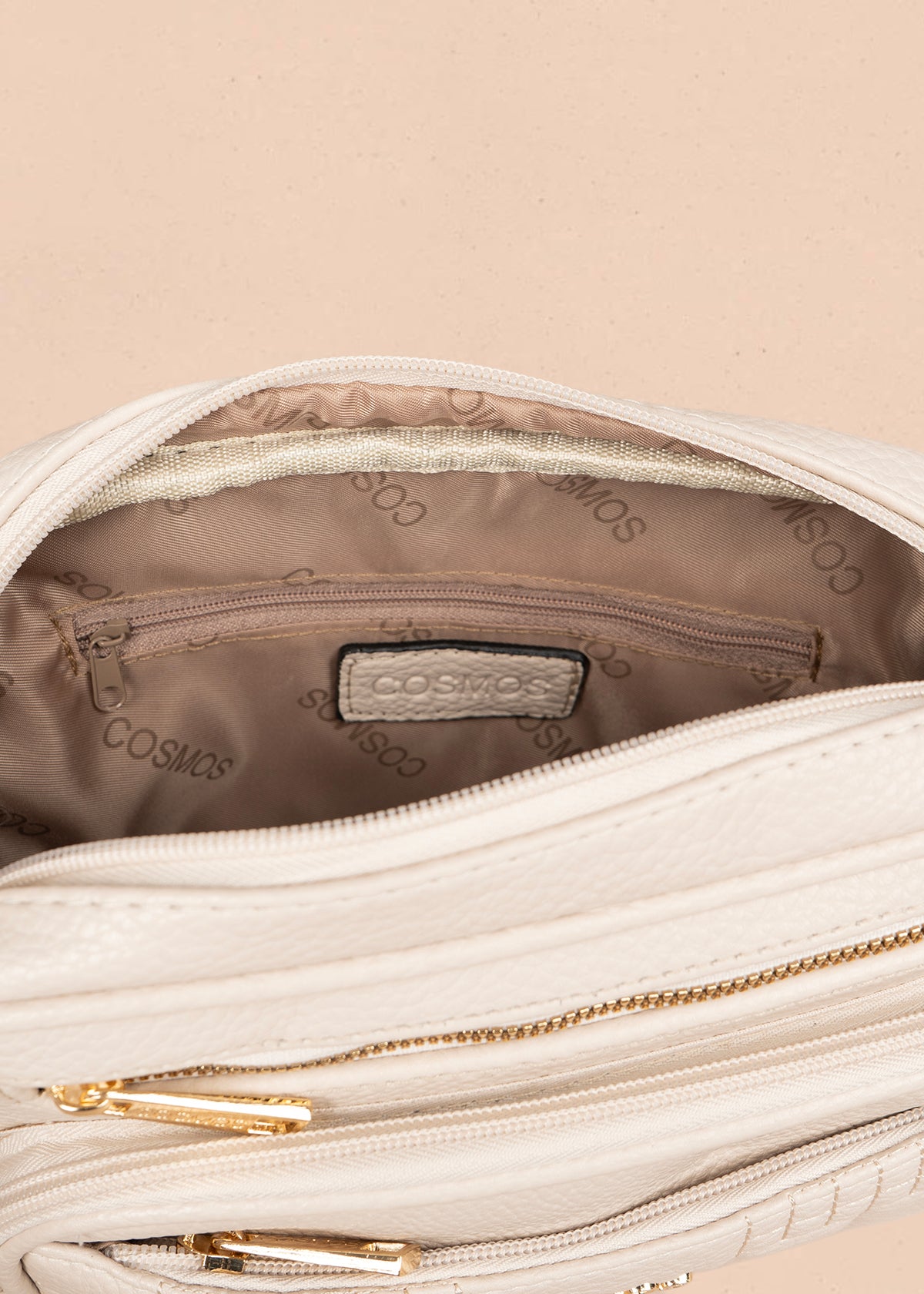 Bolso manos libres color beige con doble cremallera dorada 106336