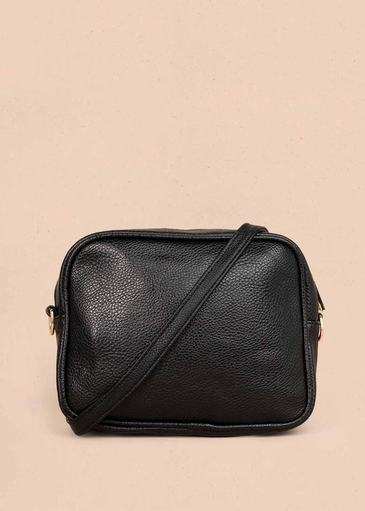 Bolso manos libres color negro con doble cremallera dorada 106336