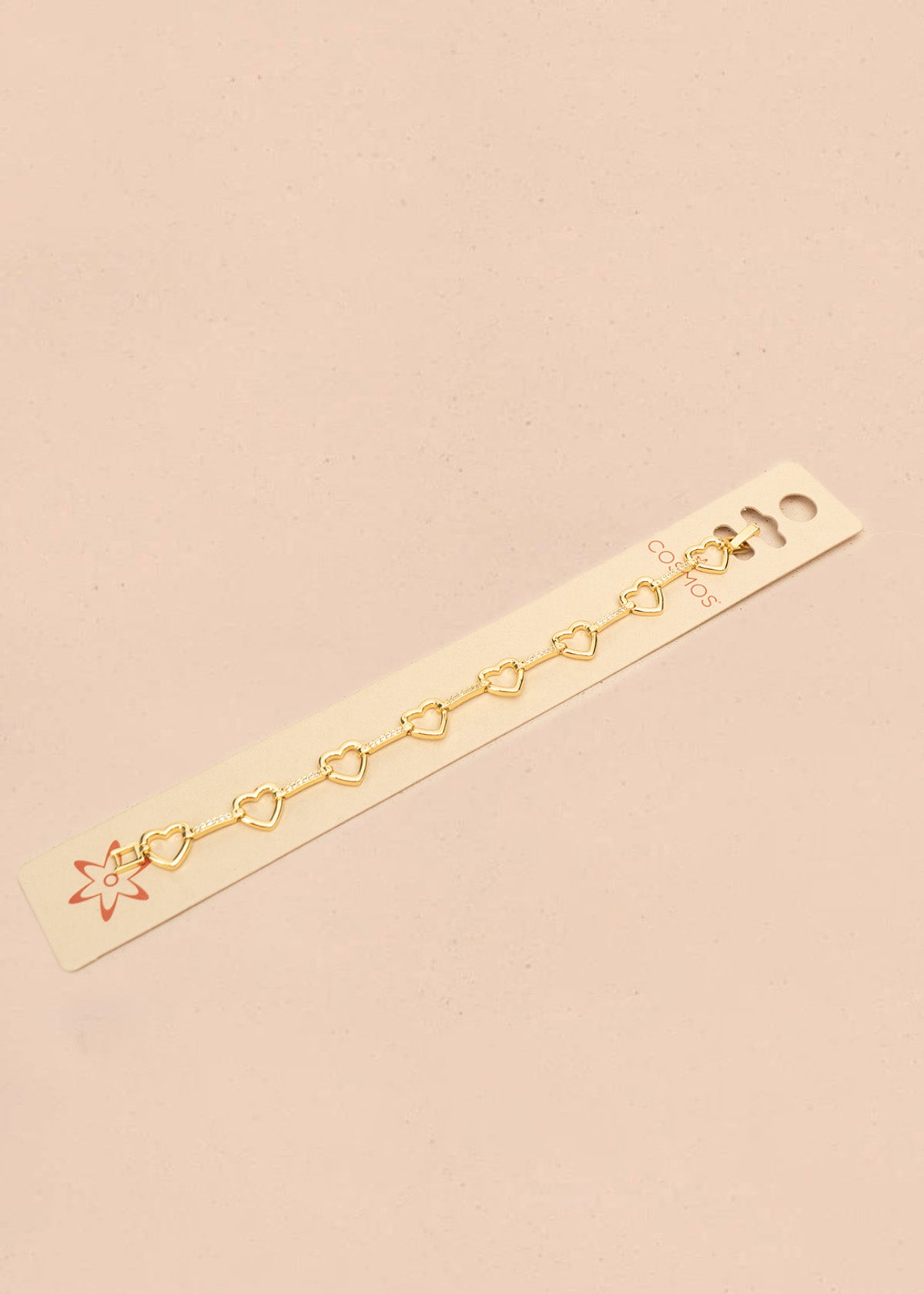 Pulsera color dorado con dijes de corazón 106396