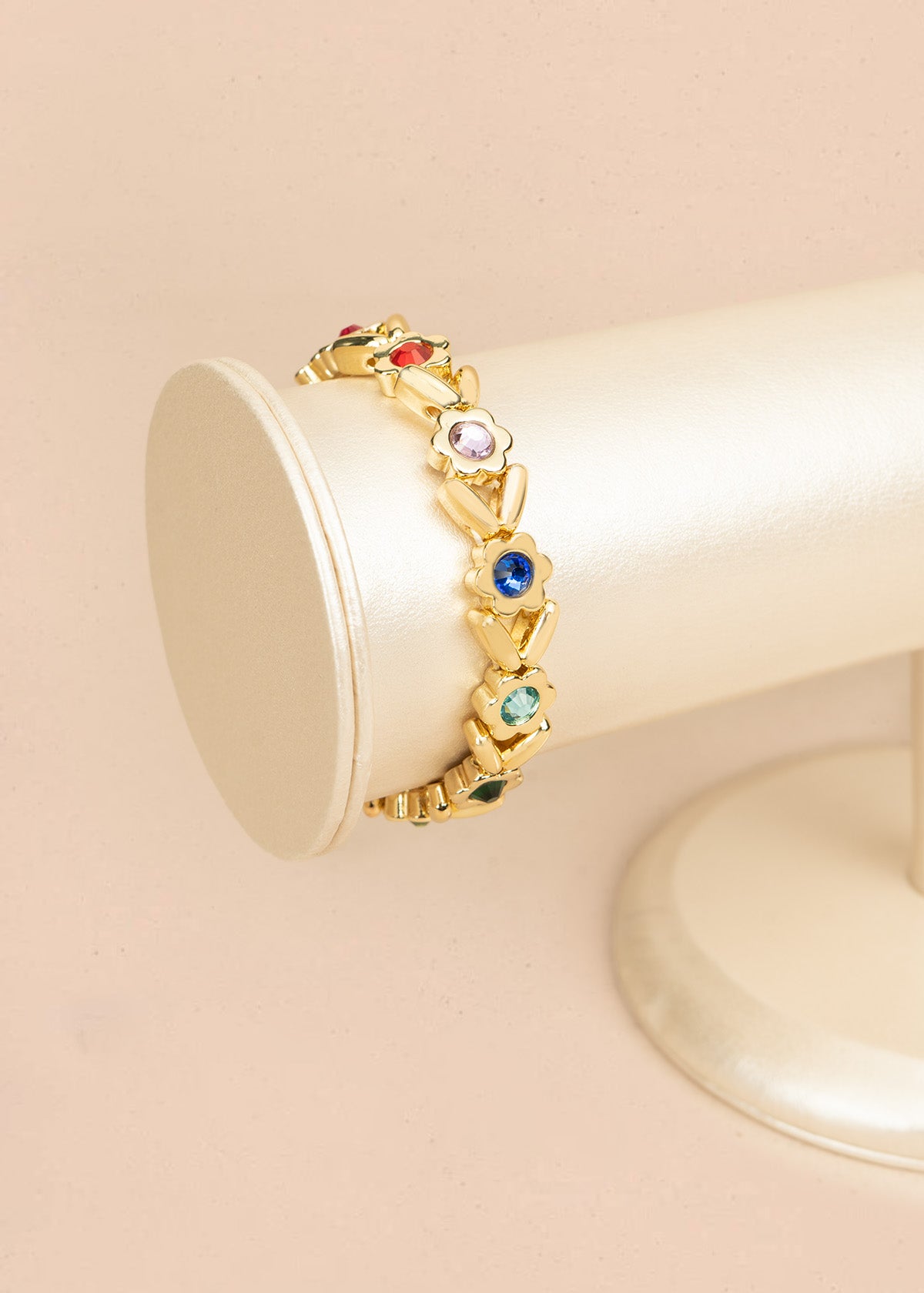Pulsera color dorado en eslabón de flores con cristales 106402