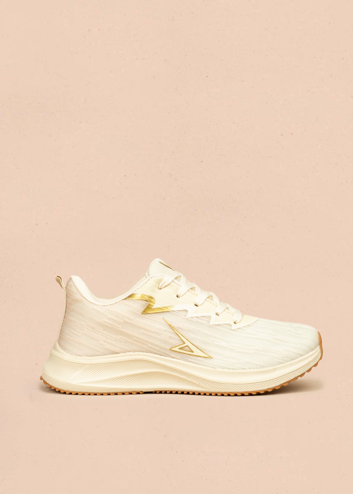 Tenis deportivos color beige con detalles dorados 106451