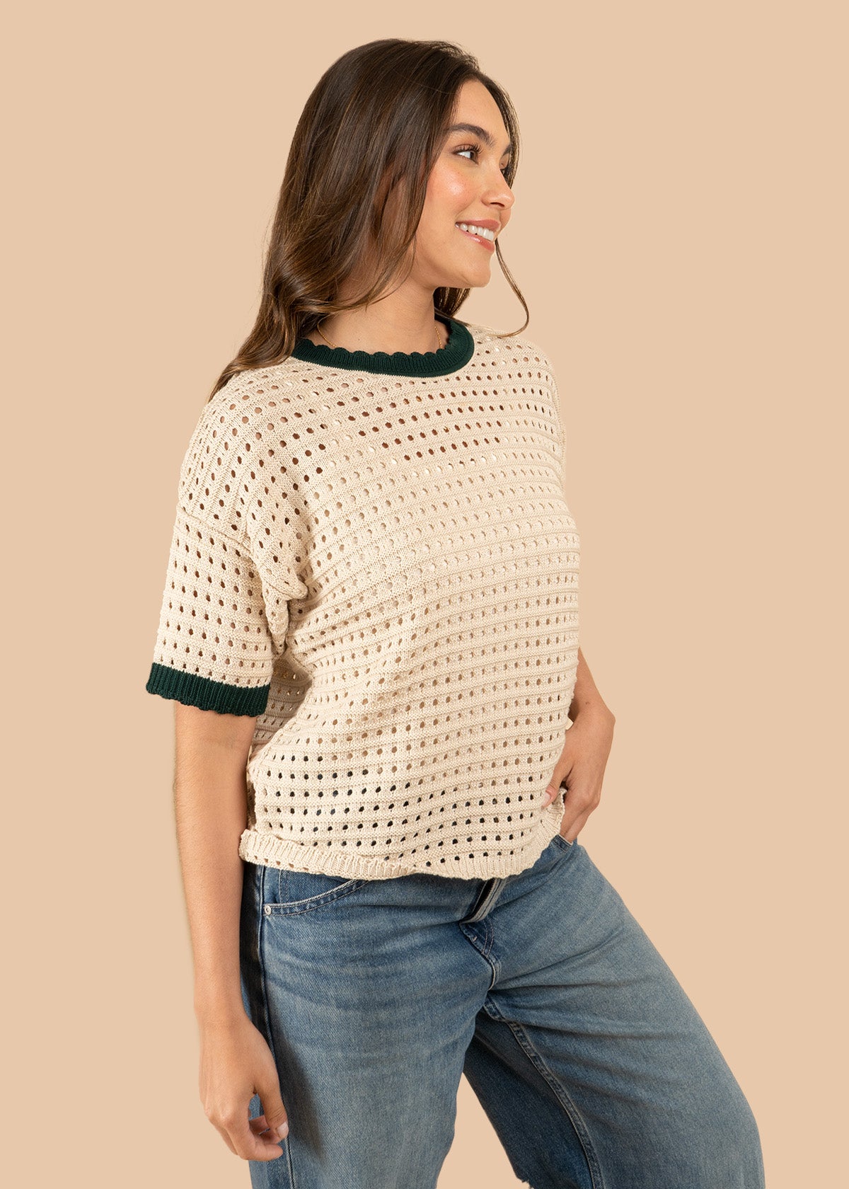 Blusa tejida color verde tipo perforado manga corta 106459