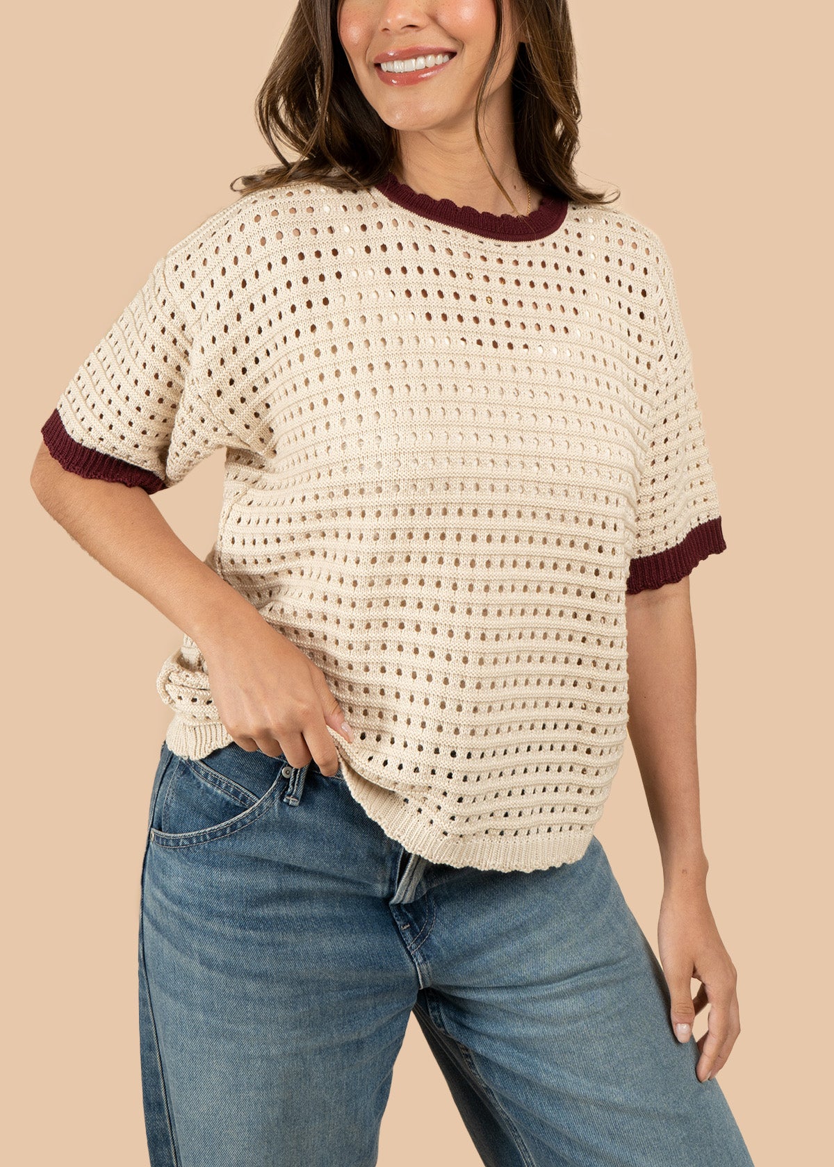 Blusa tejida color vinotinto tipo perforado manga corta 106459