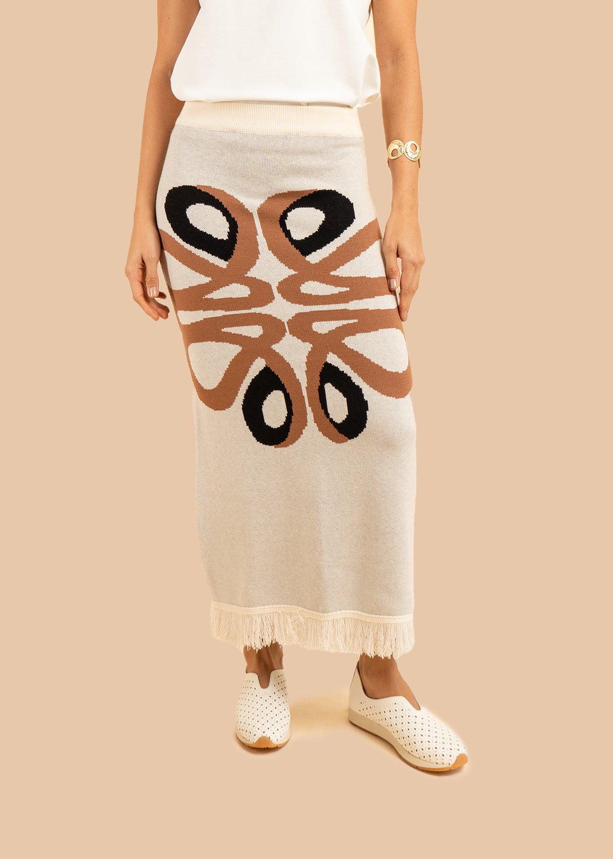 Falda larga tejida color marfil con flecos 106502