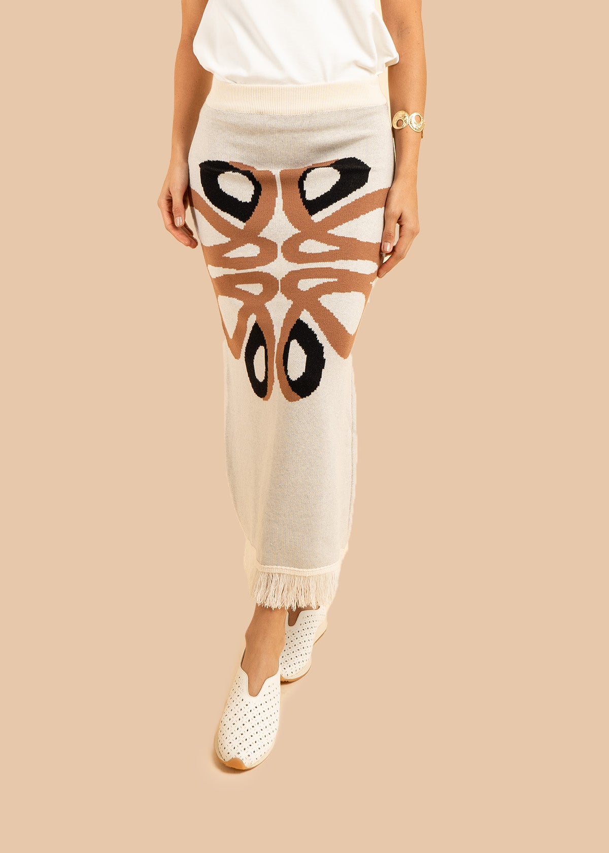 Falda larga tejida color marfil con flecos 106502