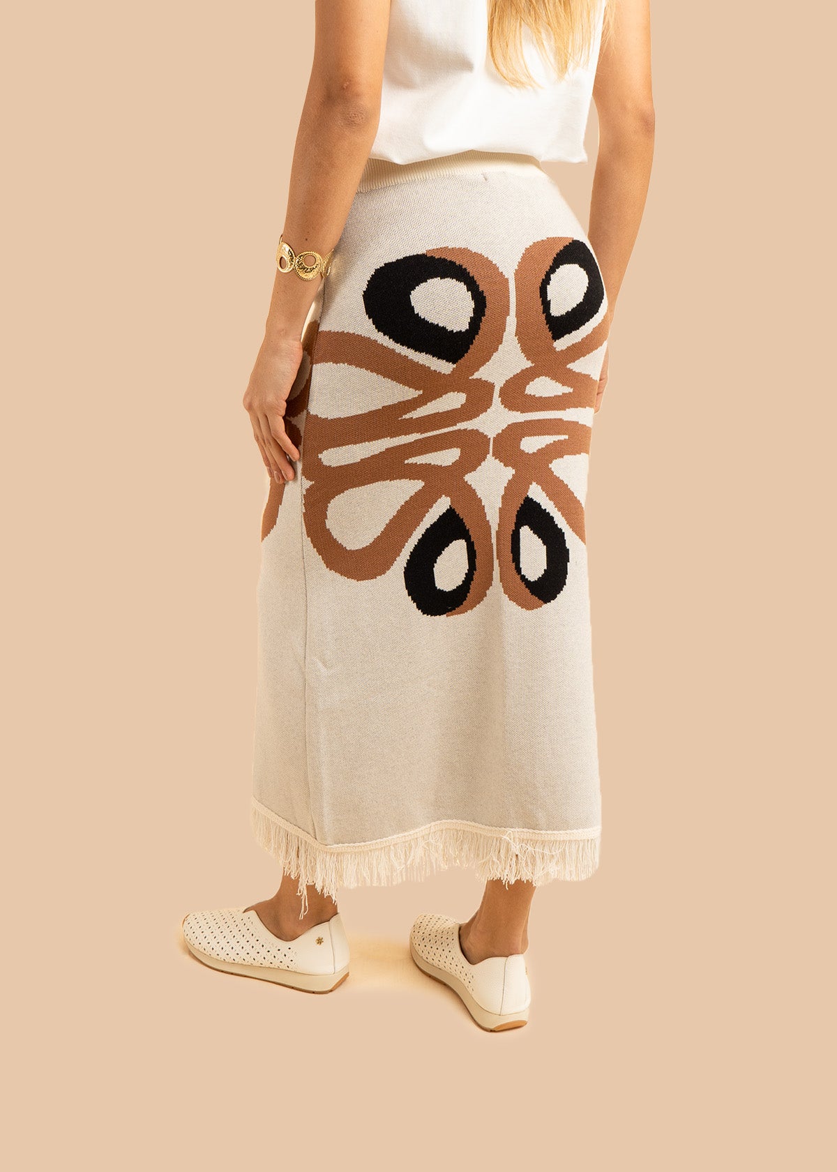 Falda larga tejida color marfil con flecos 106502