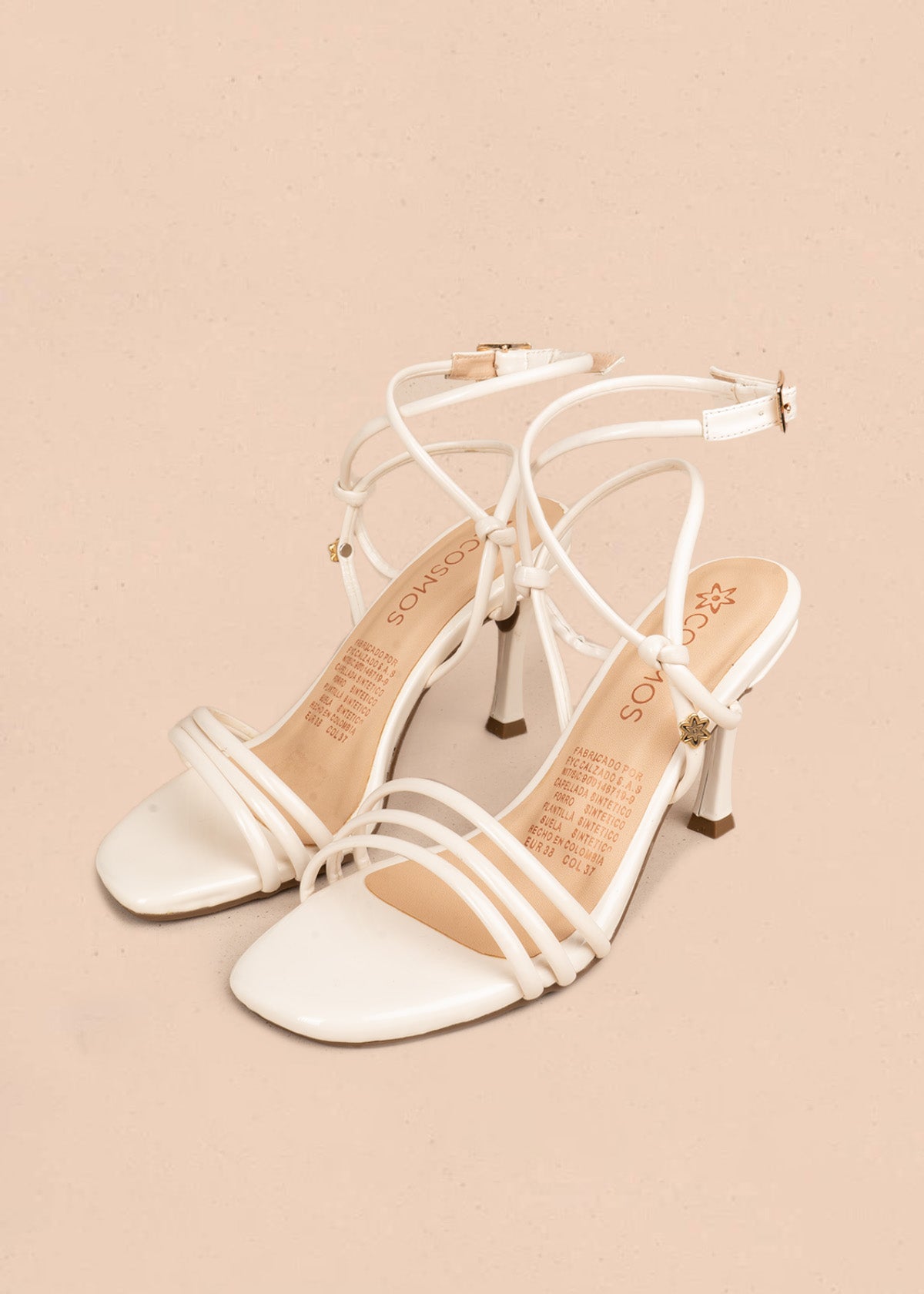 Tacones color blanco con tiras delgadas y amarre al tobillo 106527