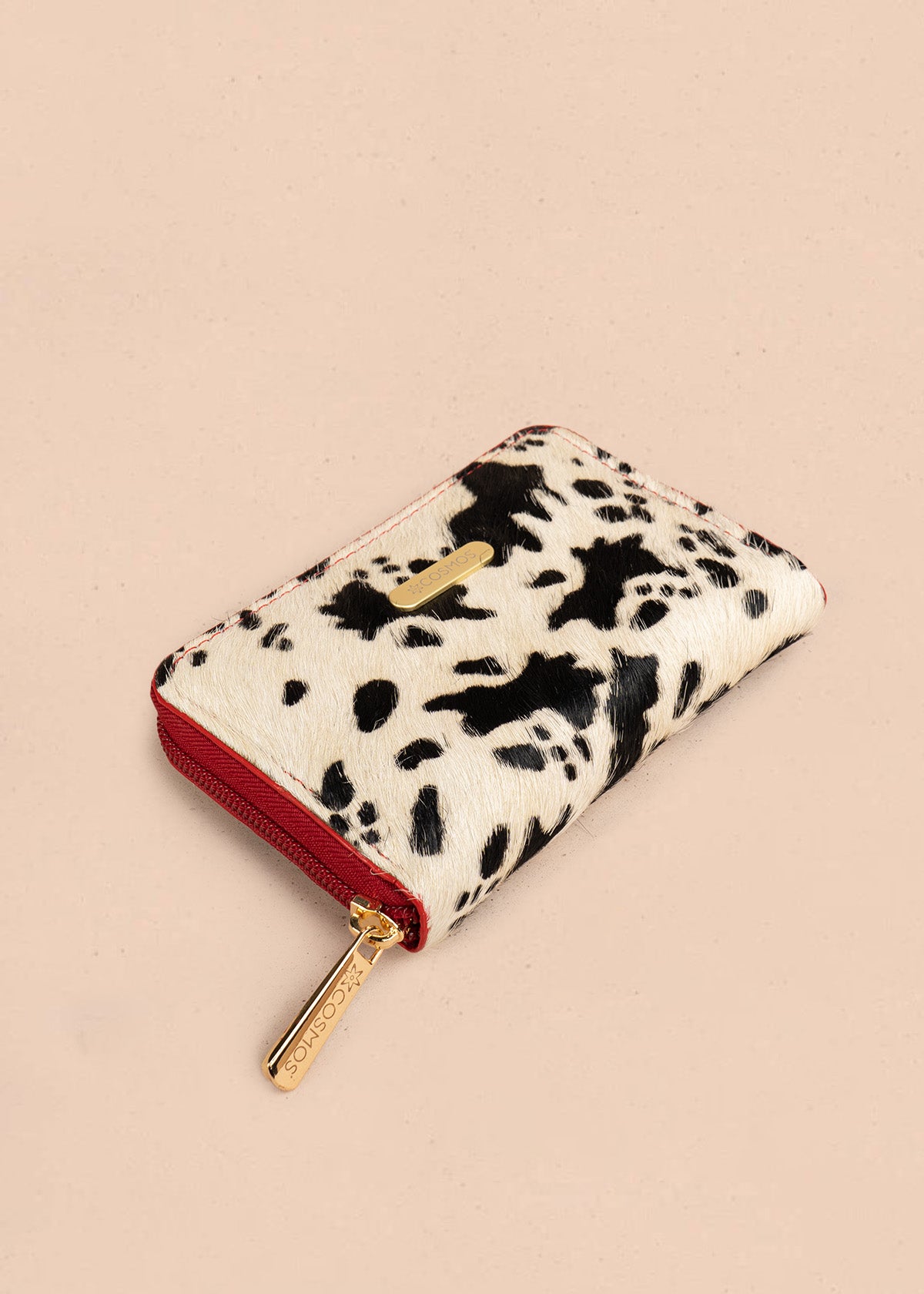 Billetera pequeña de cuero color rojo con solapa animal print 106640