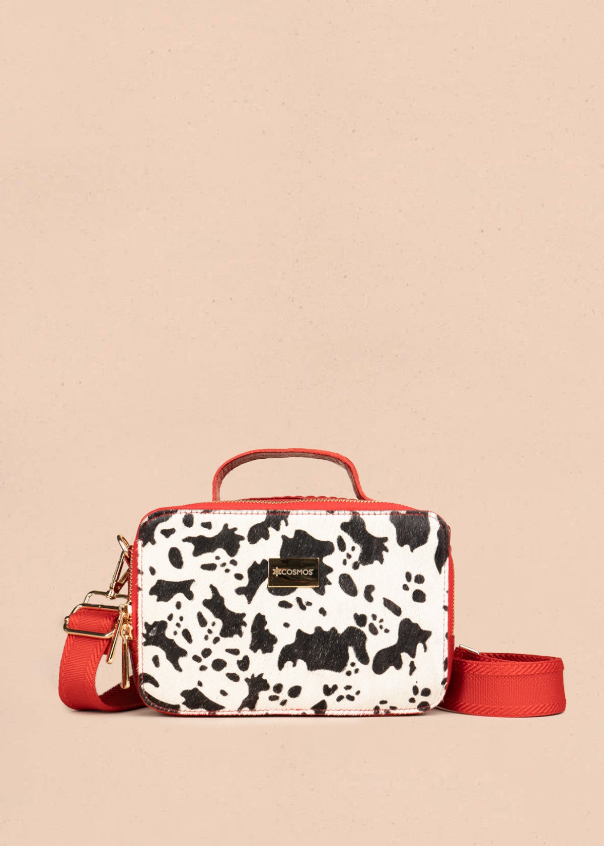 Manos libres en cuero color rojo con estampado de vaca 106645
