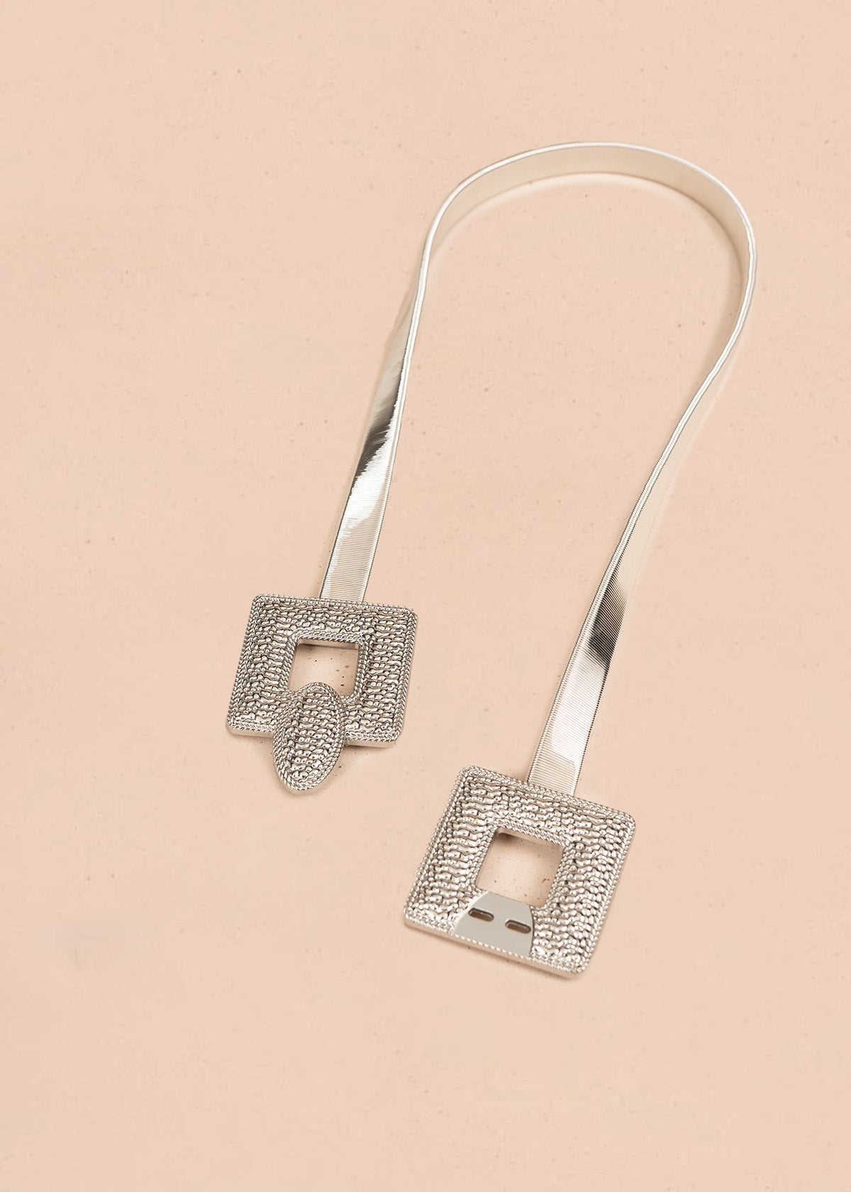 Cinturón en resorte color plata con hebillas cuadradas 106673