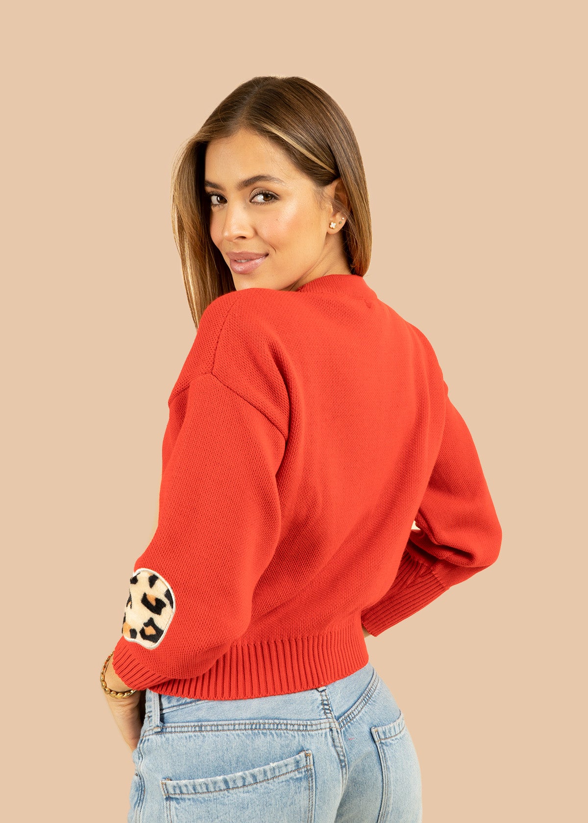 Buzo tejido color rojo con corazón en animal print 106683