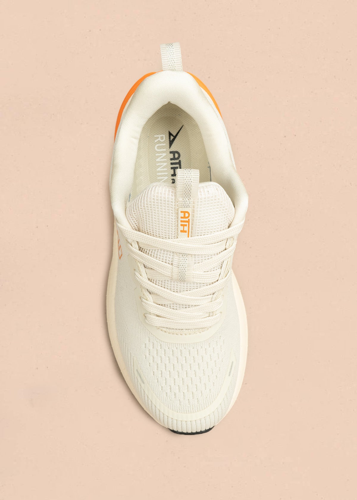 Tenis deportivos color beige con detalle naranja en suela 106690