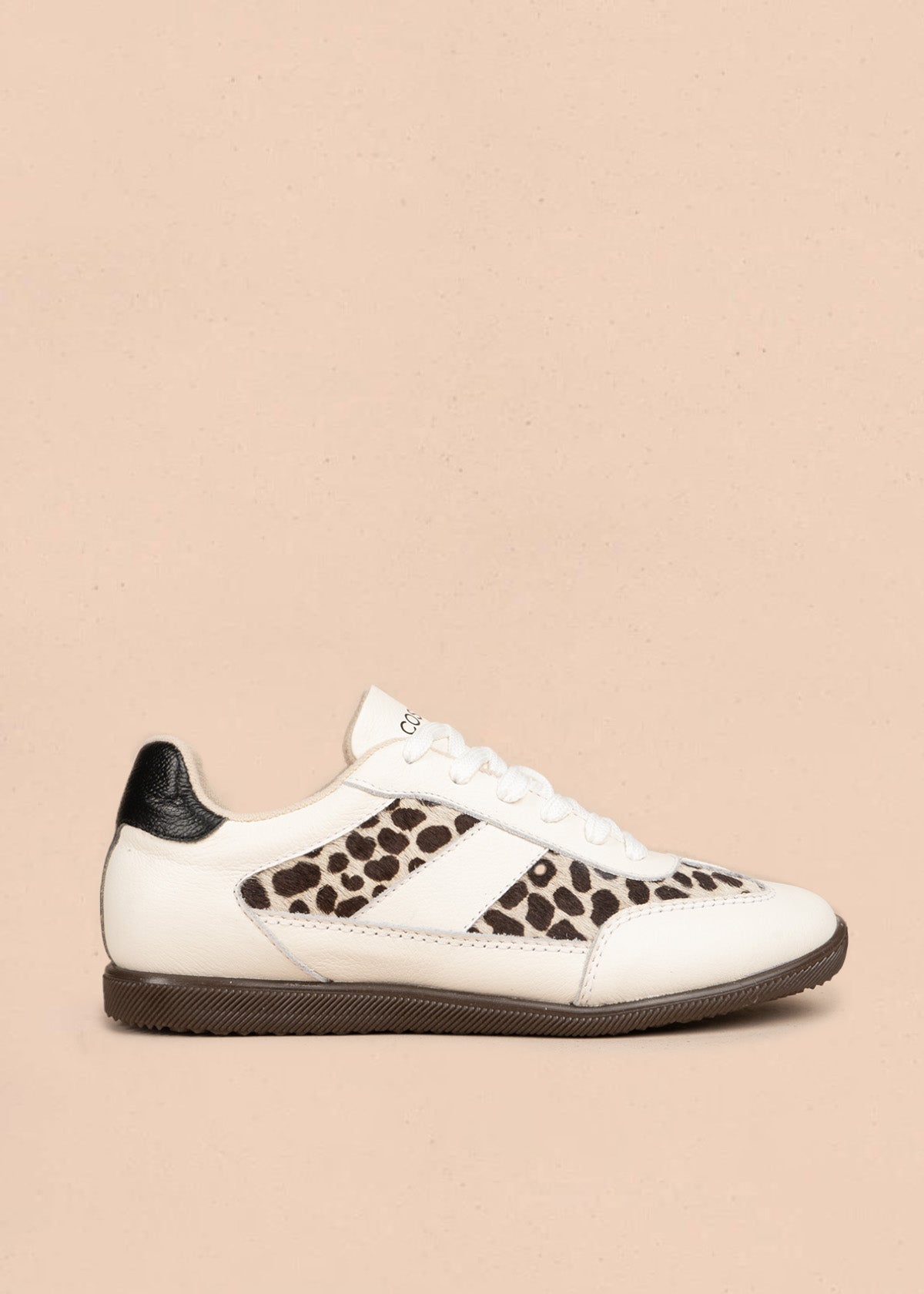 Tenis blancos con paneles de potro estampado animal print 106696