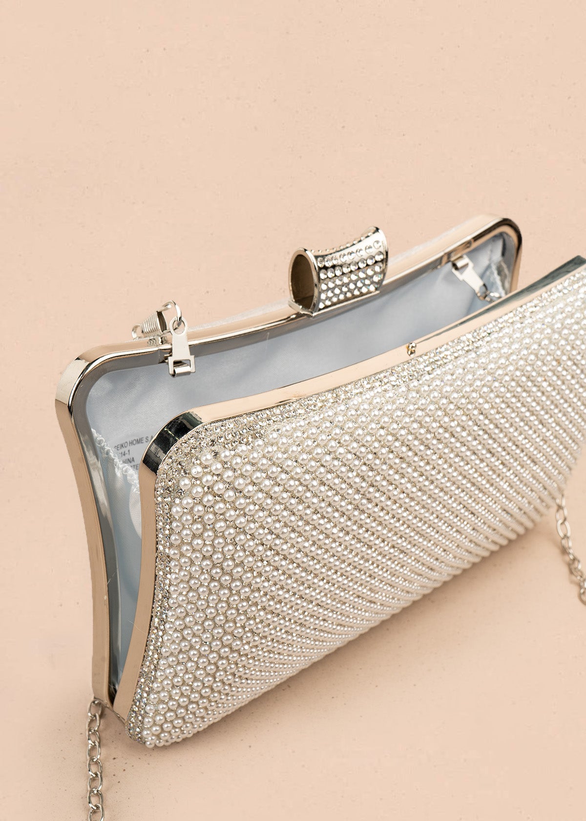 Bolso de fiesta color plata con detalle de pedrería 106808