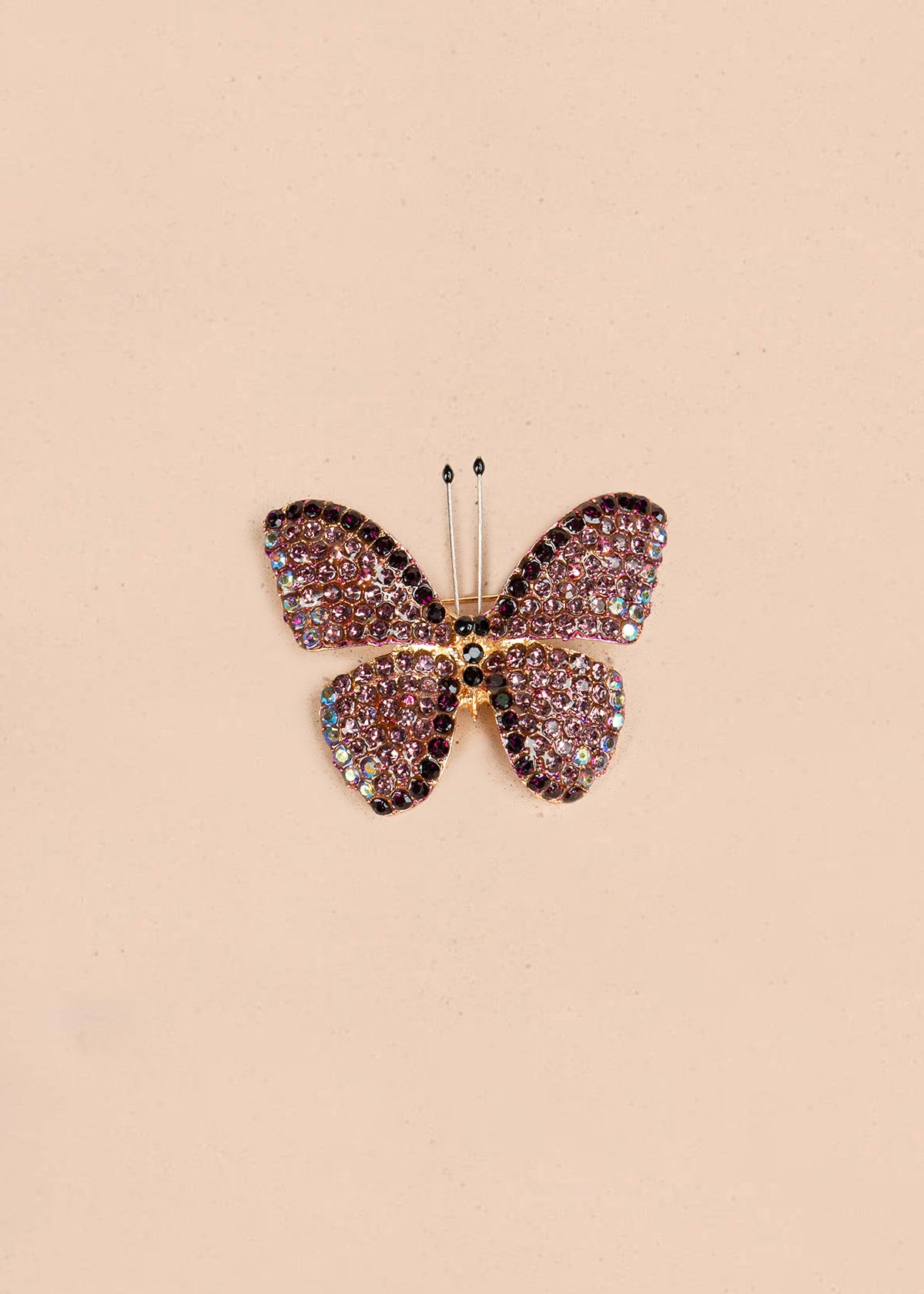 Prendedor de mariposa color rosa 106827