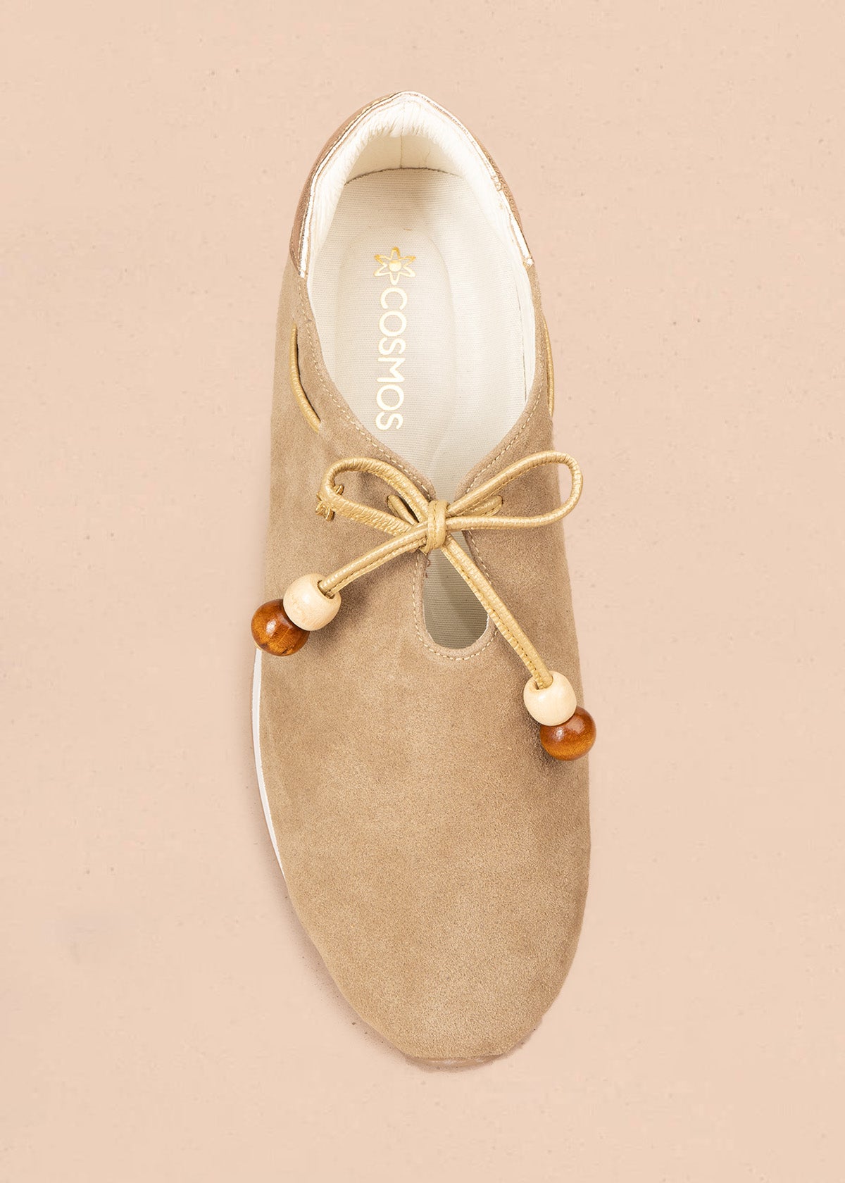 Atadura en cuero beige con cordón bronce y cuentas de madera 106934