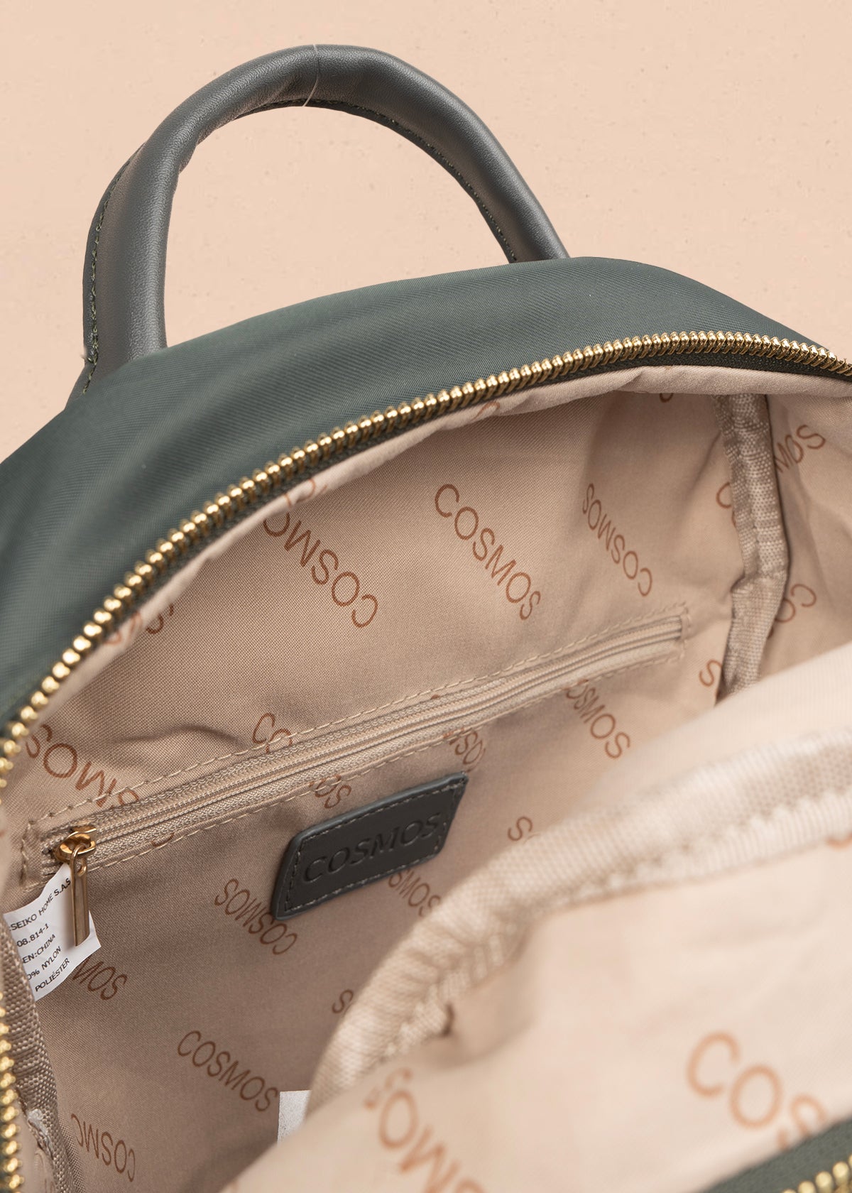 Morral color verde con bolsillo frontal y bordados 106973