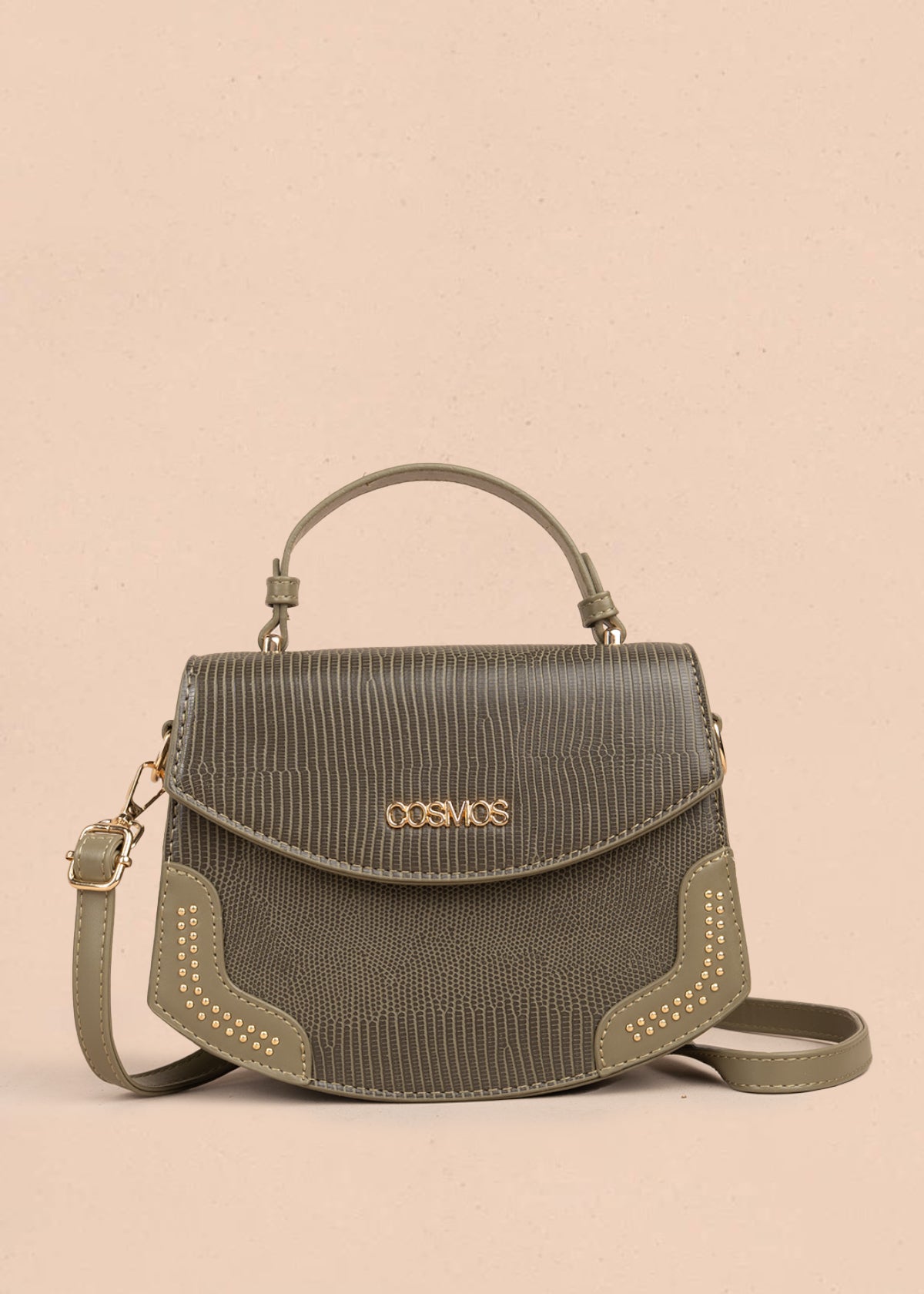 Bolso manos libres color verde con textura croco y detalles dorados 106983