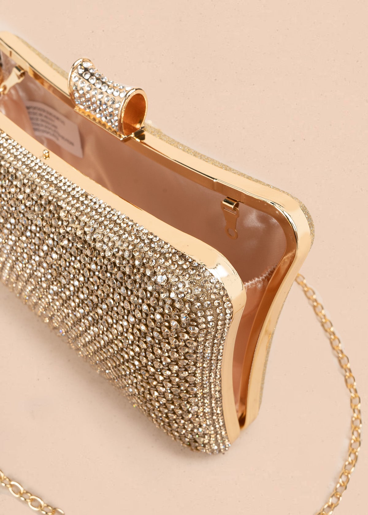 Bolso de fiesta en pedrería dorado con cadena removible 107197